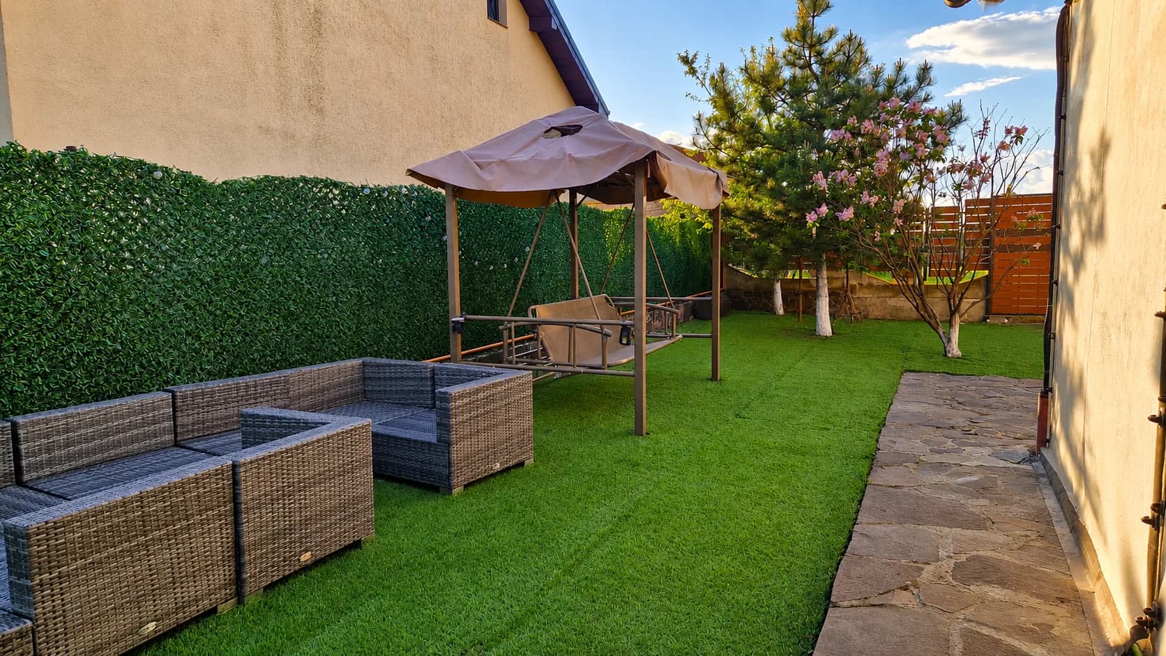 Yard with porch swing and relaxation area